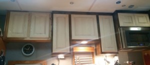 Test-fitting new cabinet doors.