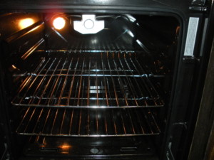 Interior of oven, with light on.