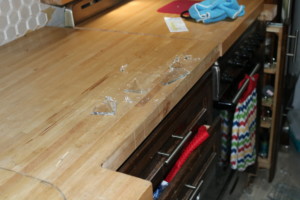 Broken plate pieces on countertop